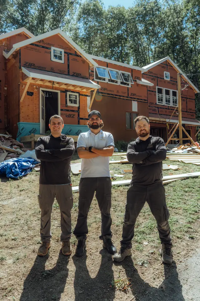 Prime crew in front of homes under construction