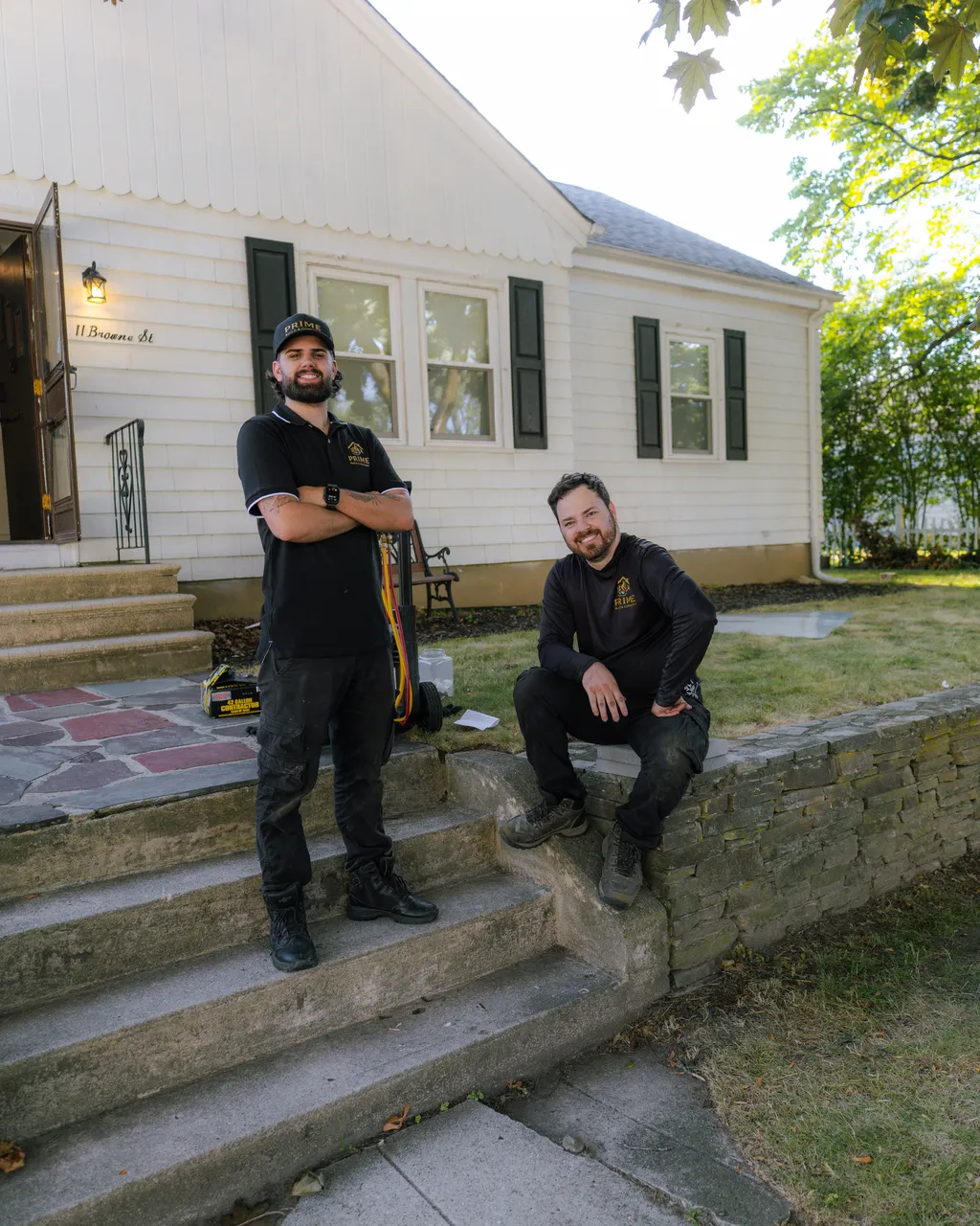 The Prime Build & Comfort crew in front of a home they serviced