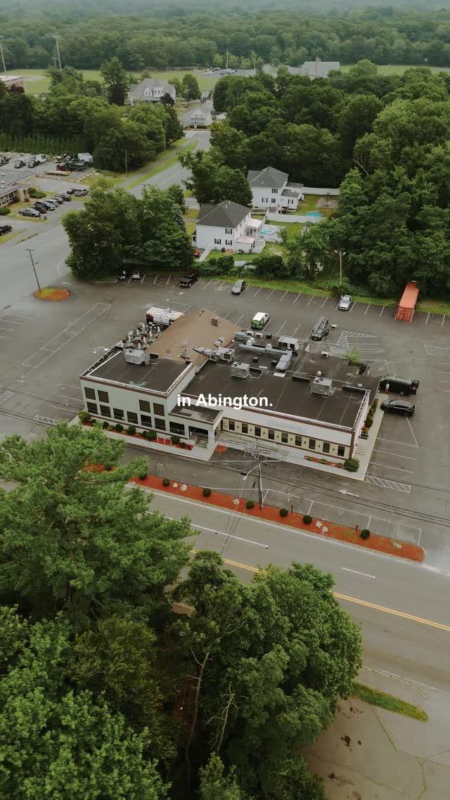 Aerial view of a completed rooftop HVAC unit on a commercial building in Abington, Massachusetts