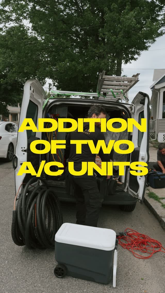 Prime crew member unloading gear from the van for a two-unit AC installation