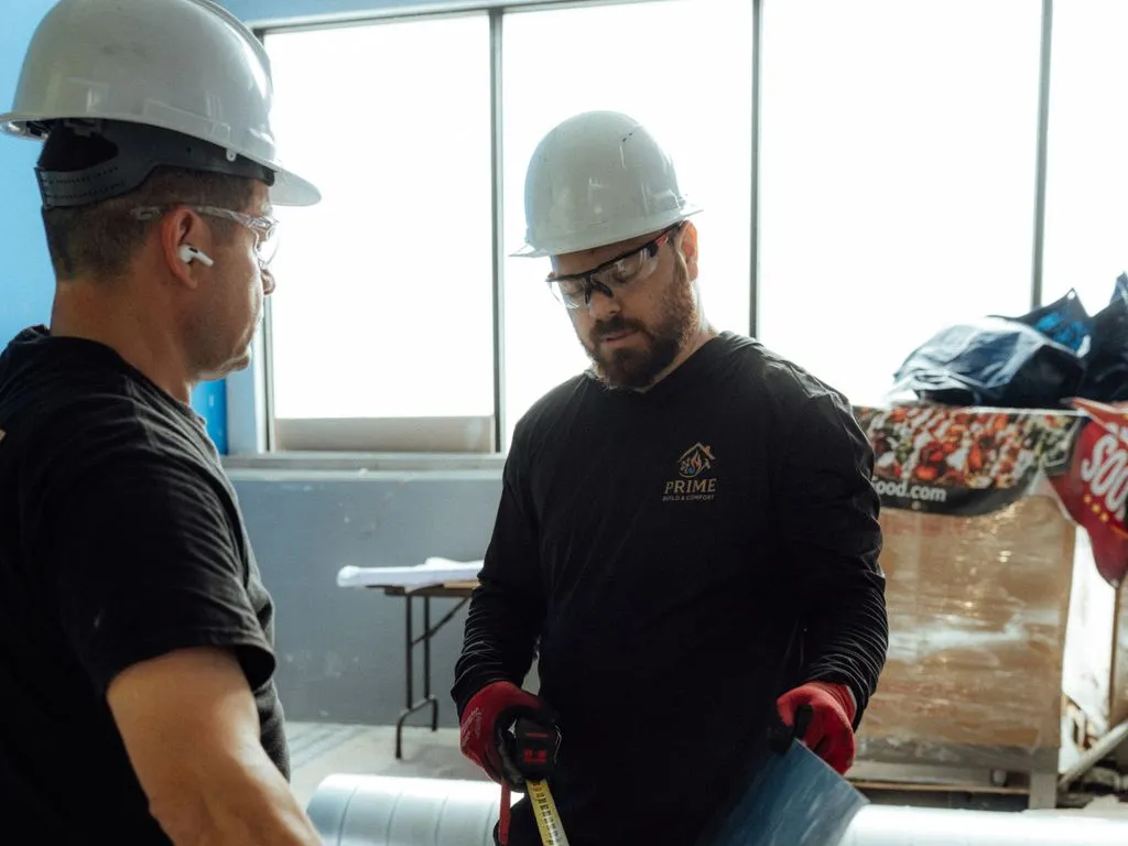 Prime crew fitting sheet-metal ductwork